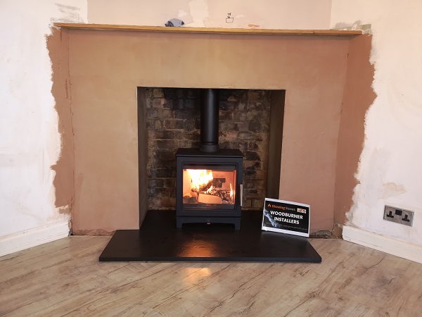 Fireplace knockout and Wood burner installation, Taunton.